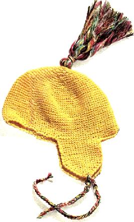 Вязание. Желтая шапочка